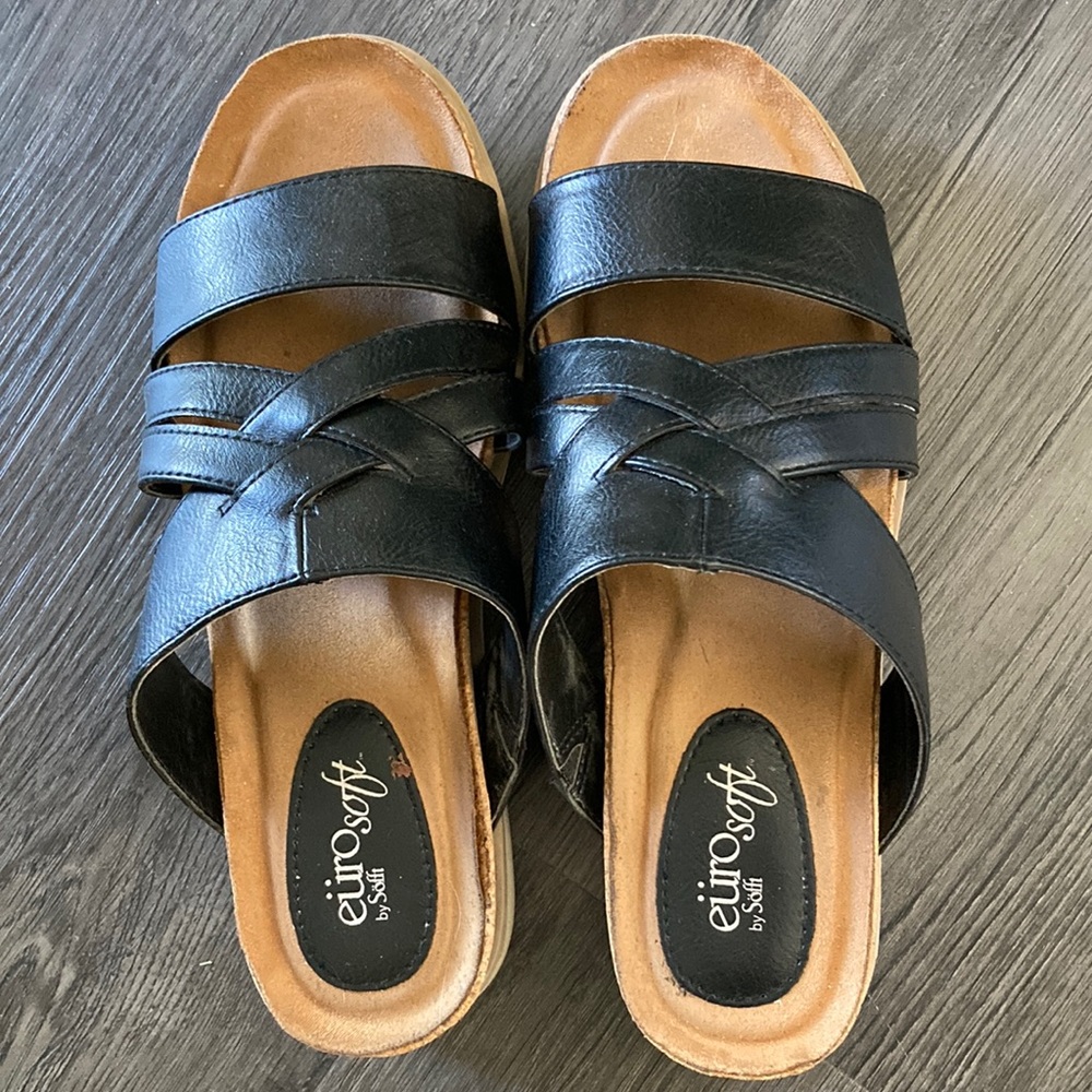 Beautiful pair of euro soft wedge sandals in size 8.